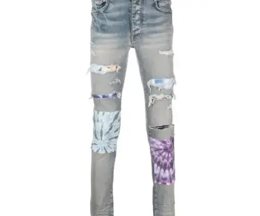 AMIRI Tie Dye Art Patch Skinny Jeans Fade White