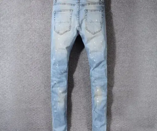 Alternative view of Amiri Ripped Jeans Fade Blue