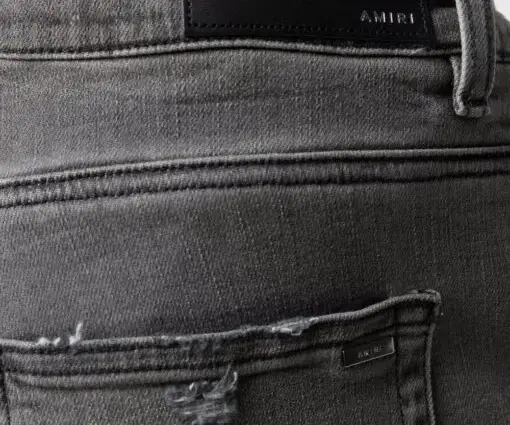 Alternative view of Amiri Wide Jeans Absorption Effect Grey