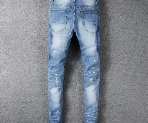 Alternative view of Amiri Ripped Jeans Fade Blue