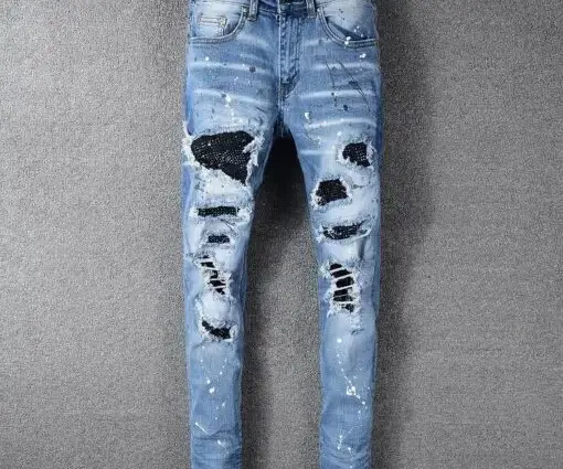 Amiri Ripped Jeans Fade Blue