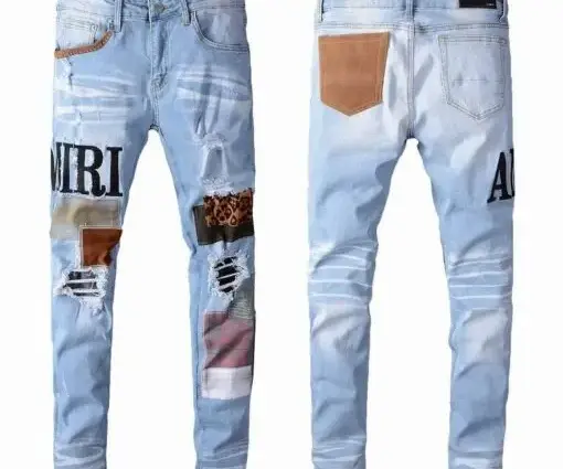 Amiri MX1-style Ripped Jeans Fade Blue