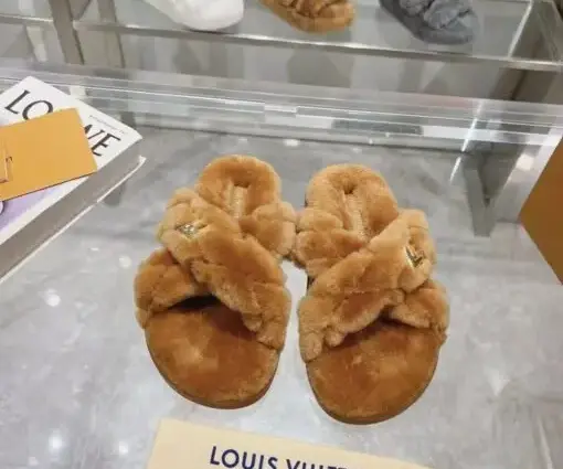 LV Bliss Brand Plaque Shearling Mules Plush Straps Gold Tone