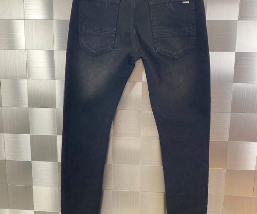 Alternative view of Amiri Varsity Patch Jeans Antique Black With Distressed Details